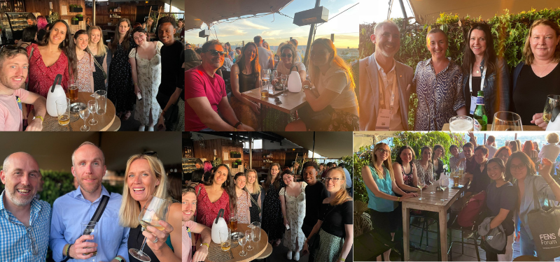 People socialising on rooftop bar over Paris