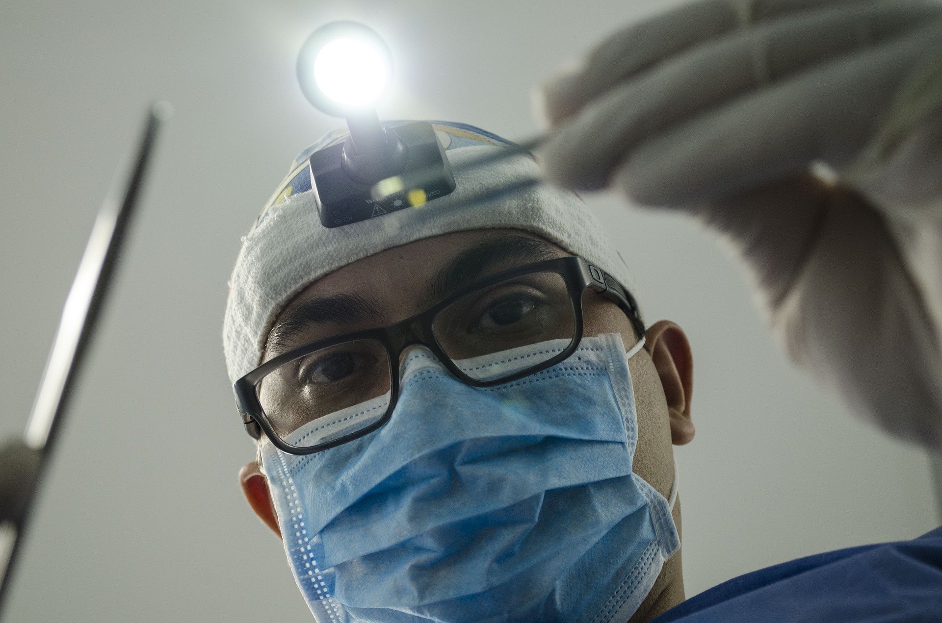 dentist looking down into a patient's mouth